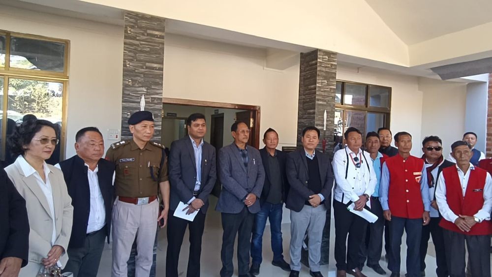 Officials and others during the inauguration of Terogvunyu village community hall on February 19.